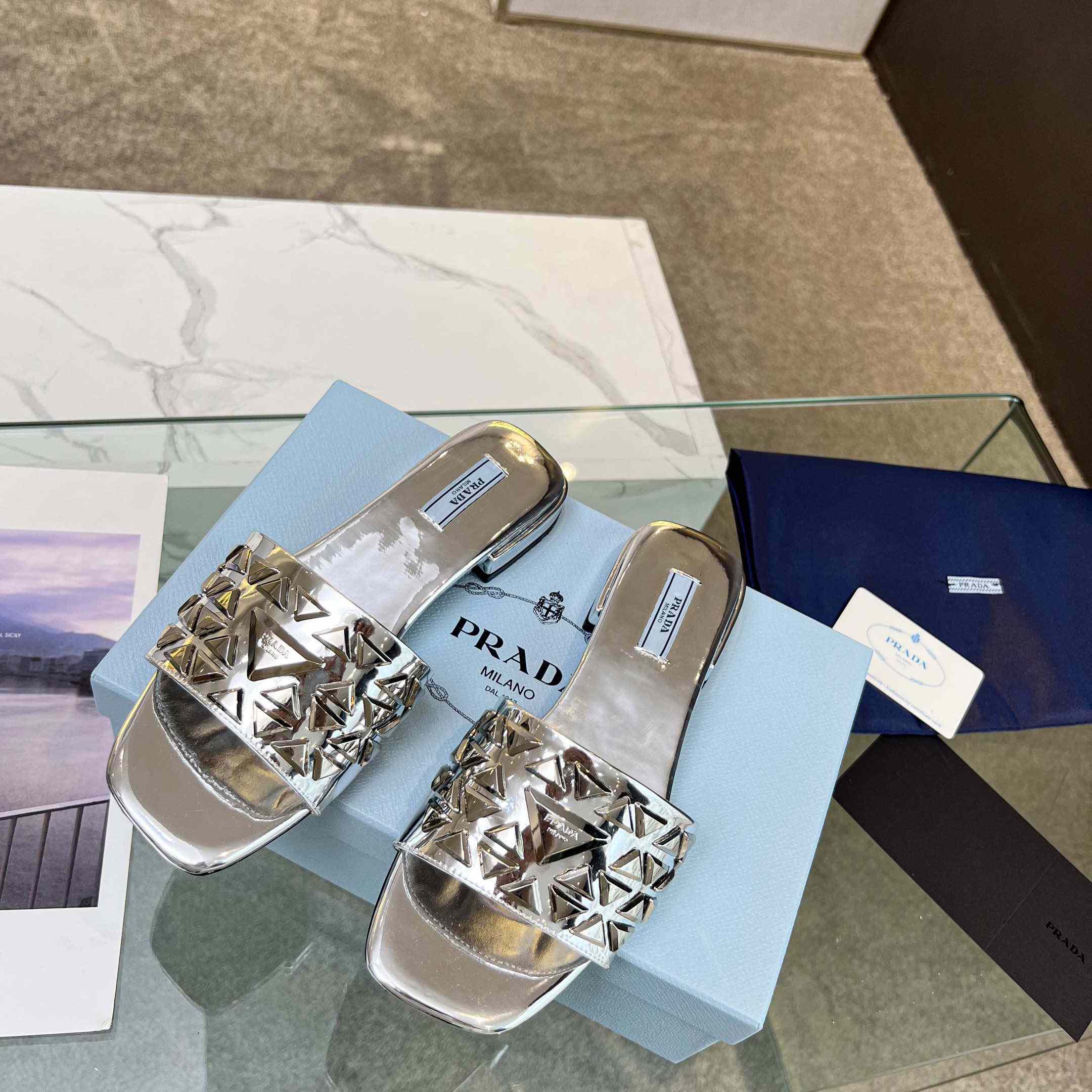Prada Studded Metallic Leather Slides - FashionPlug