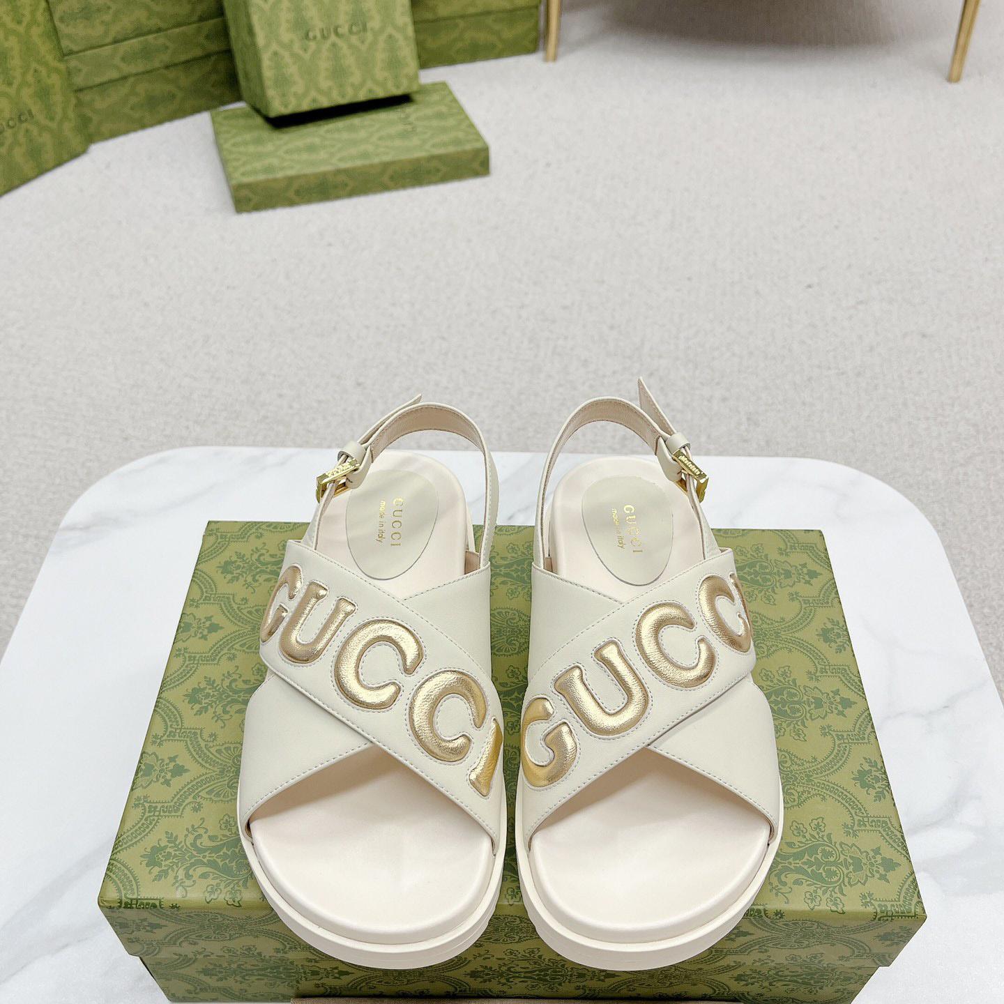 Gucci White Embossed Sandals - FashionPlug