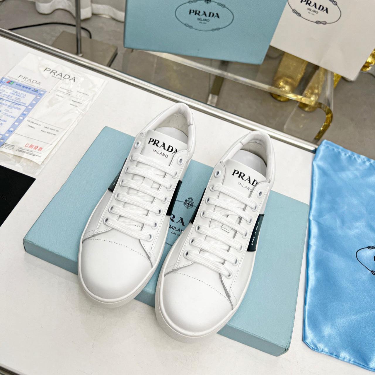 Prada Brushed Leather And Leather Sneakers - FashionPlug