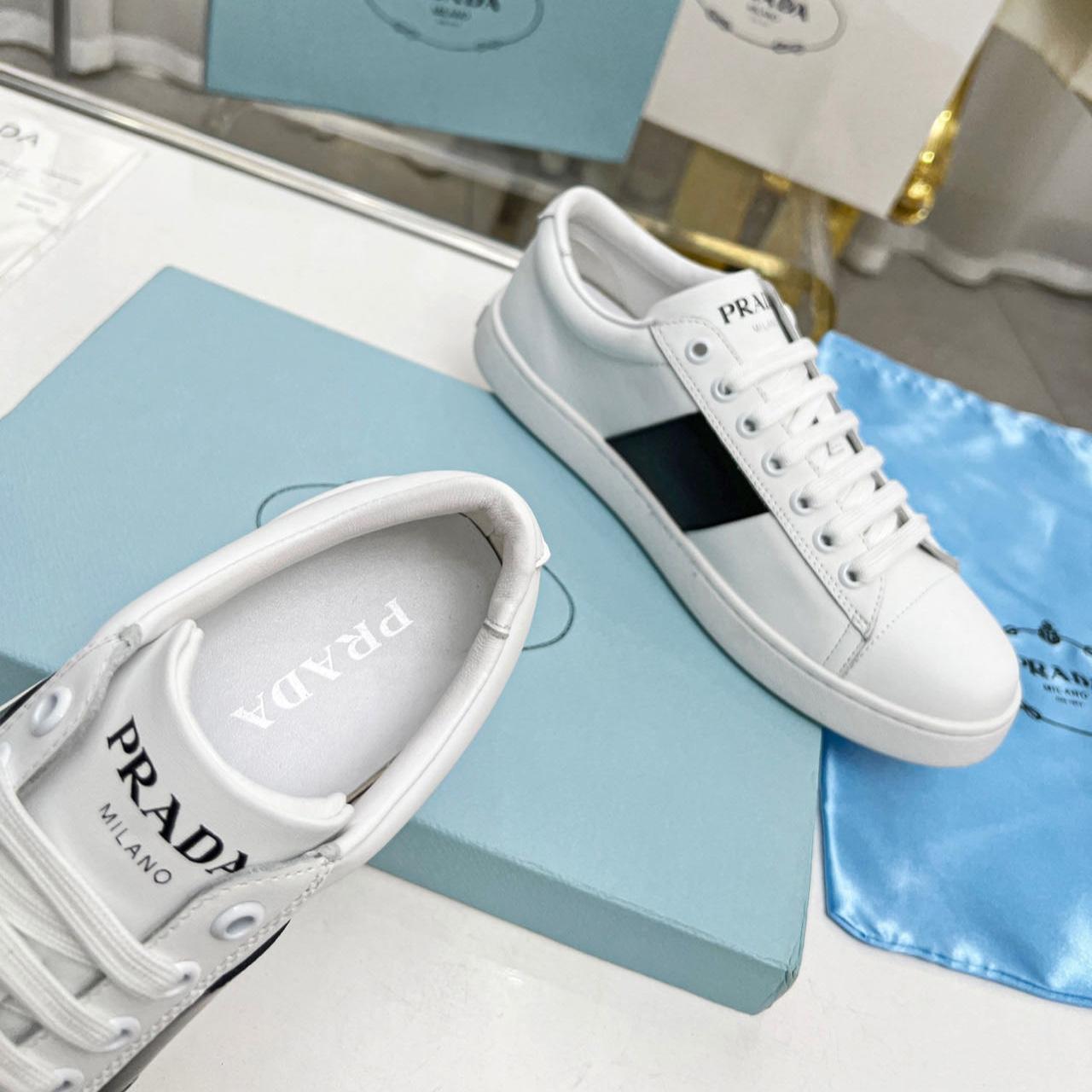 Prada Brushed Leather And Leather Sneakers - FashionPlug