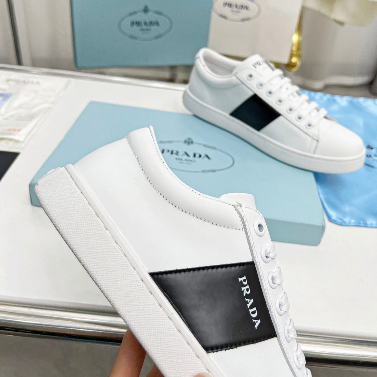 Prada Brushed Leather And Leather Sneakers - FashionPlug