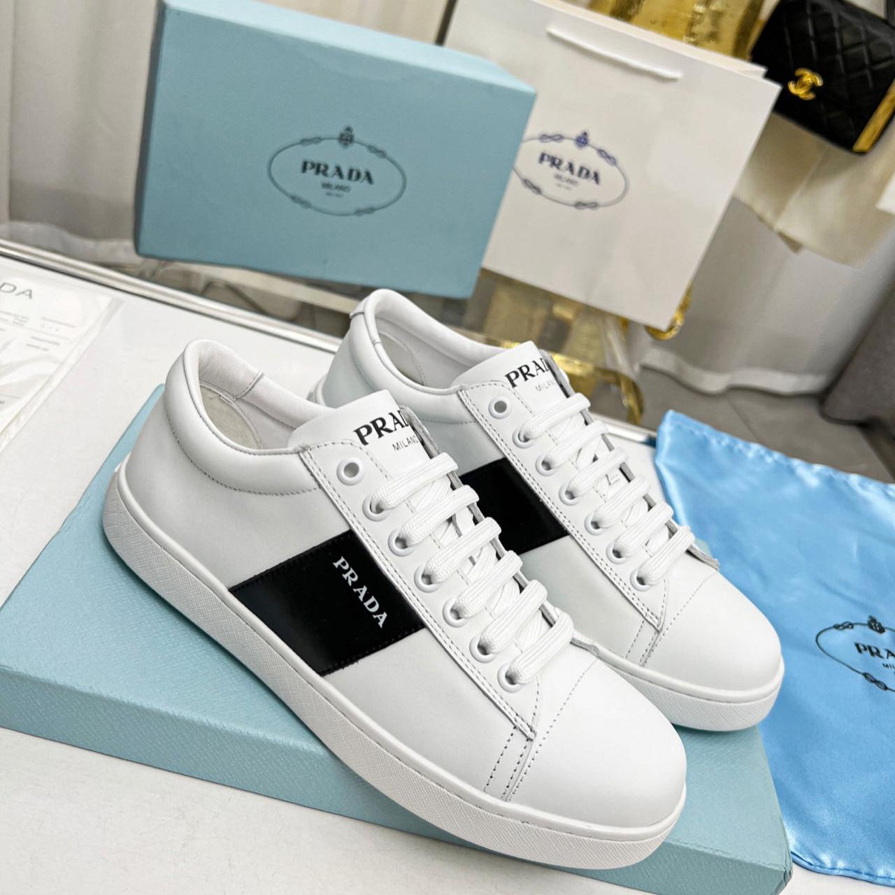 Prada Brushed Leather And Leather Sneakers - FashionPlug