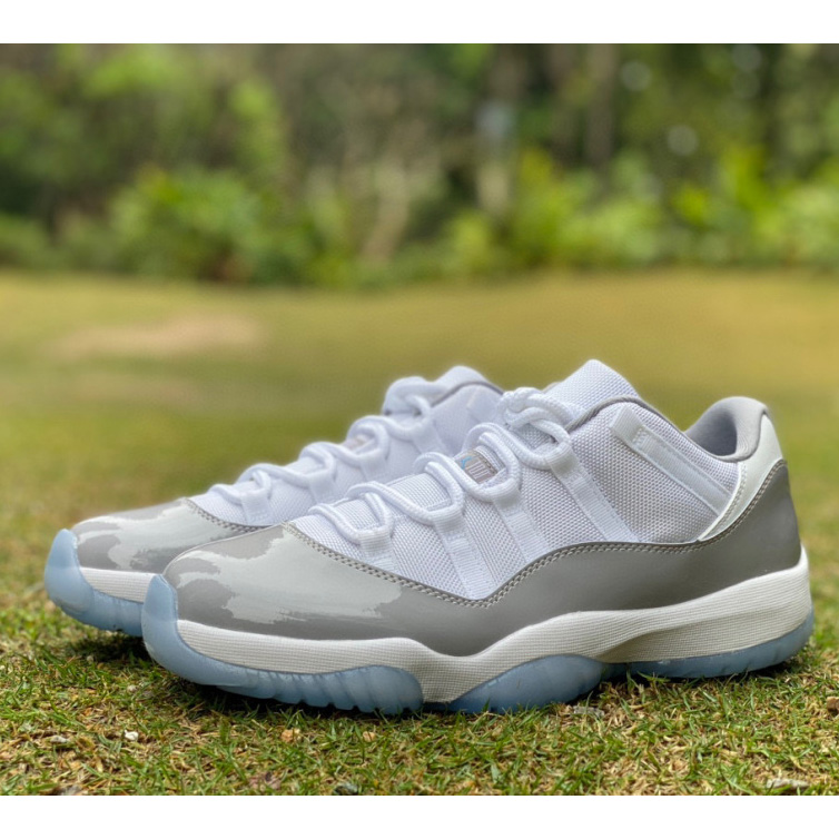 Air Jordan 11 Retro Low "Cement Grev" Sneaker     av2187-140 - FashionPlug