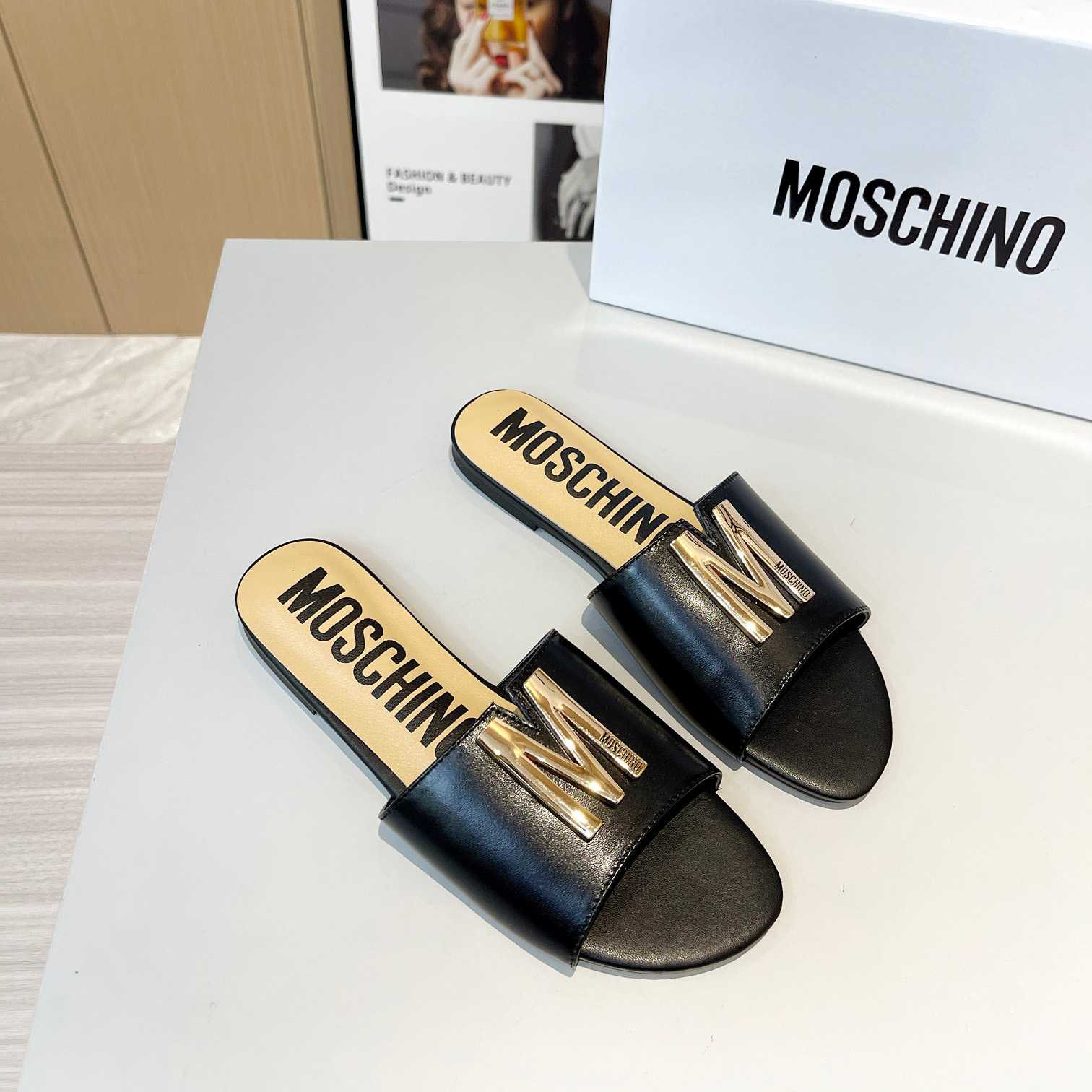 Moschino M Plaque Sandals - FashionPlug