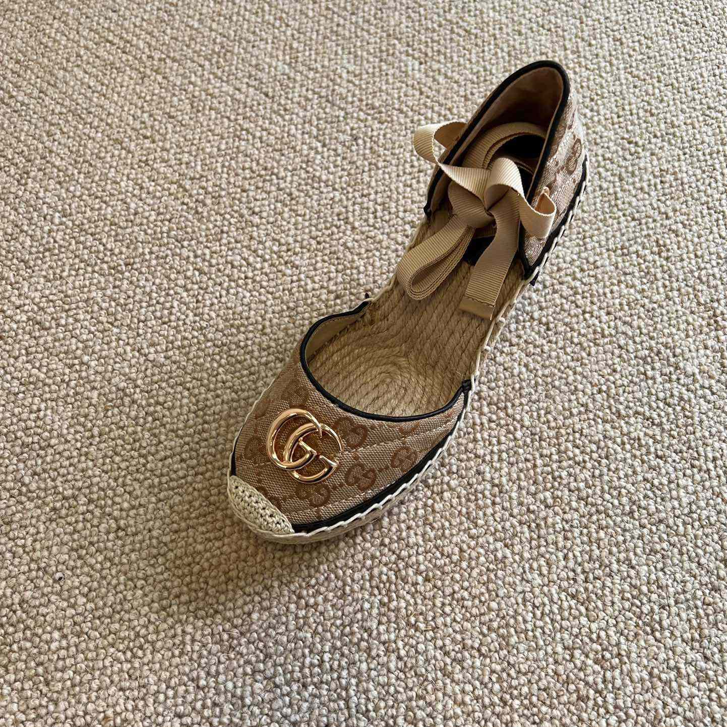 Gucci Women's GG Matelassé Platform Espadrille - FashionPlug