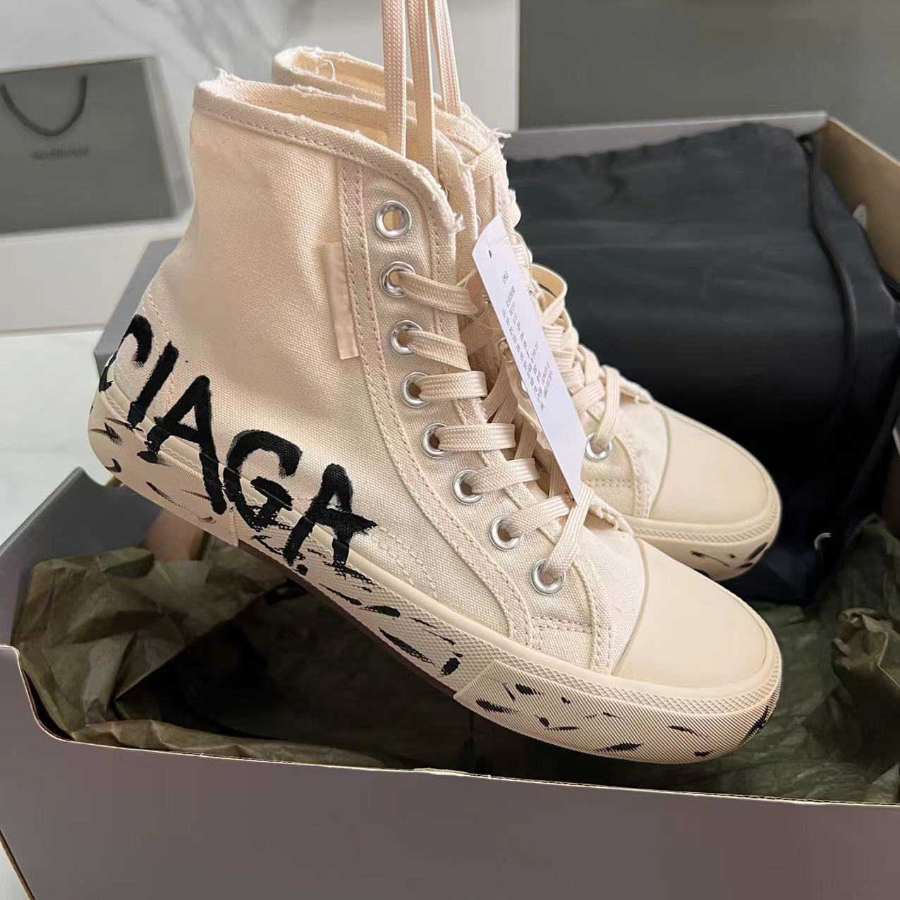 Balenciaga Paris High Top Graffiti Sneaker In White  - FashionPlug