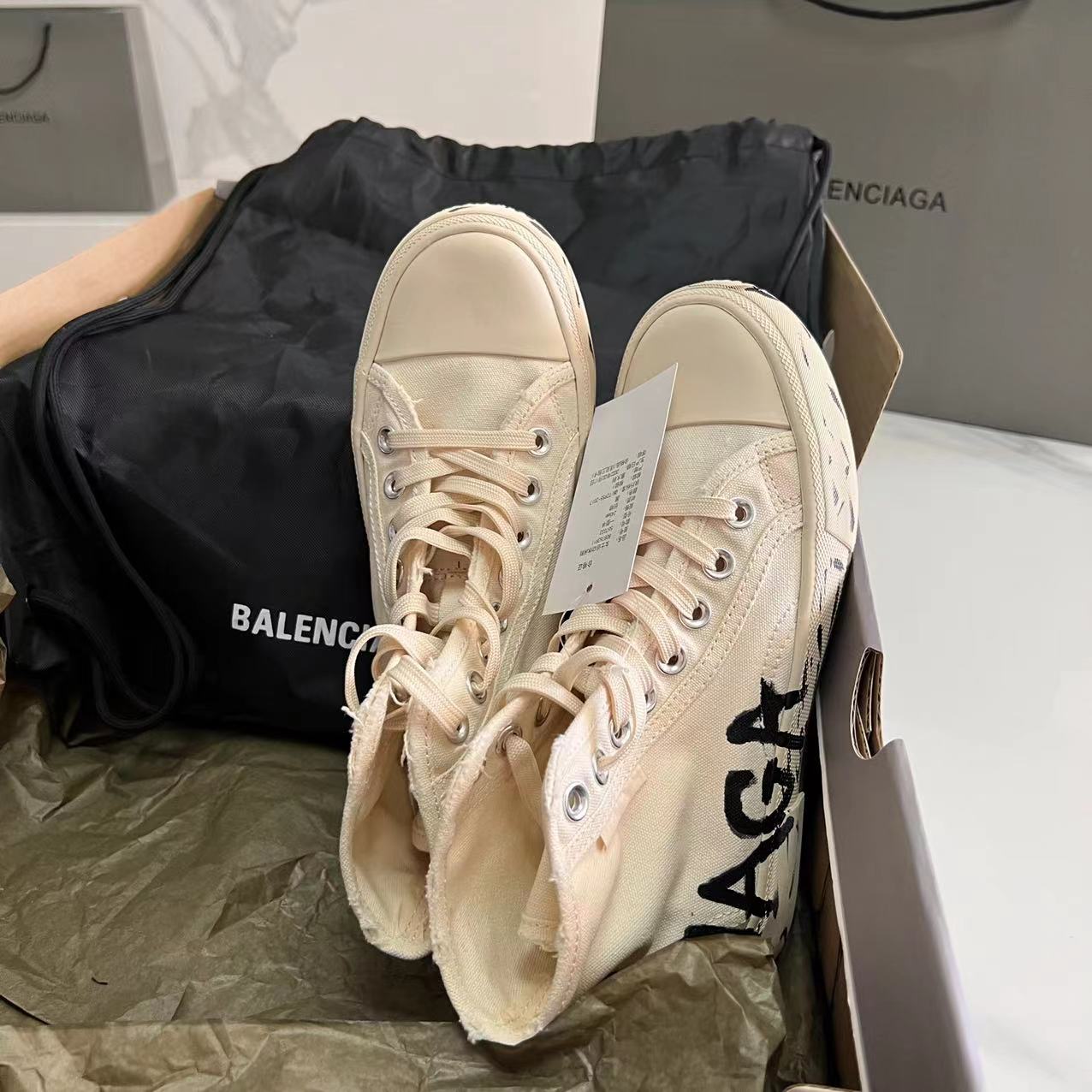 Balenciaga Paris High Top Graffiti Sneaker In White  - FashionPlug