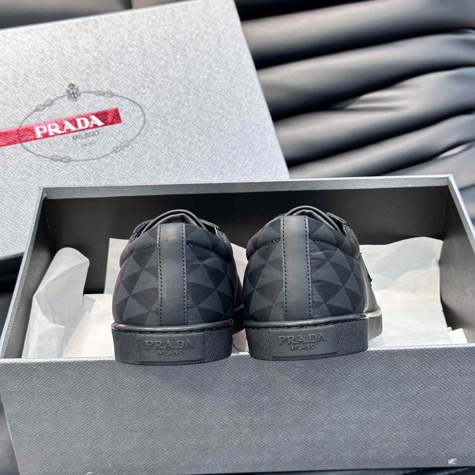 Prada Leather And Re-Nylon Sneakers - FashionPlug
