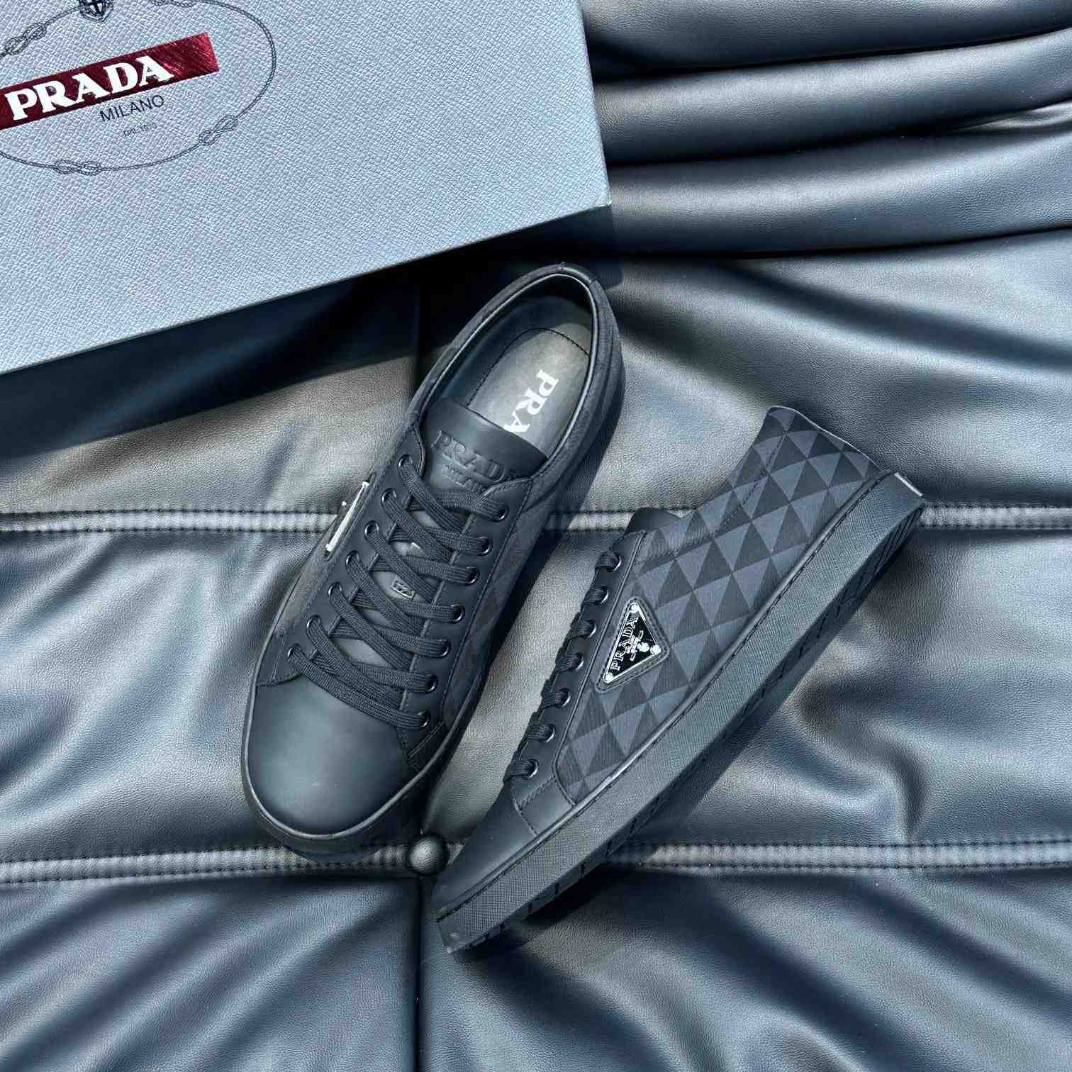 Prada Leather And Re-Nylon Sneakers - FashionPlug