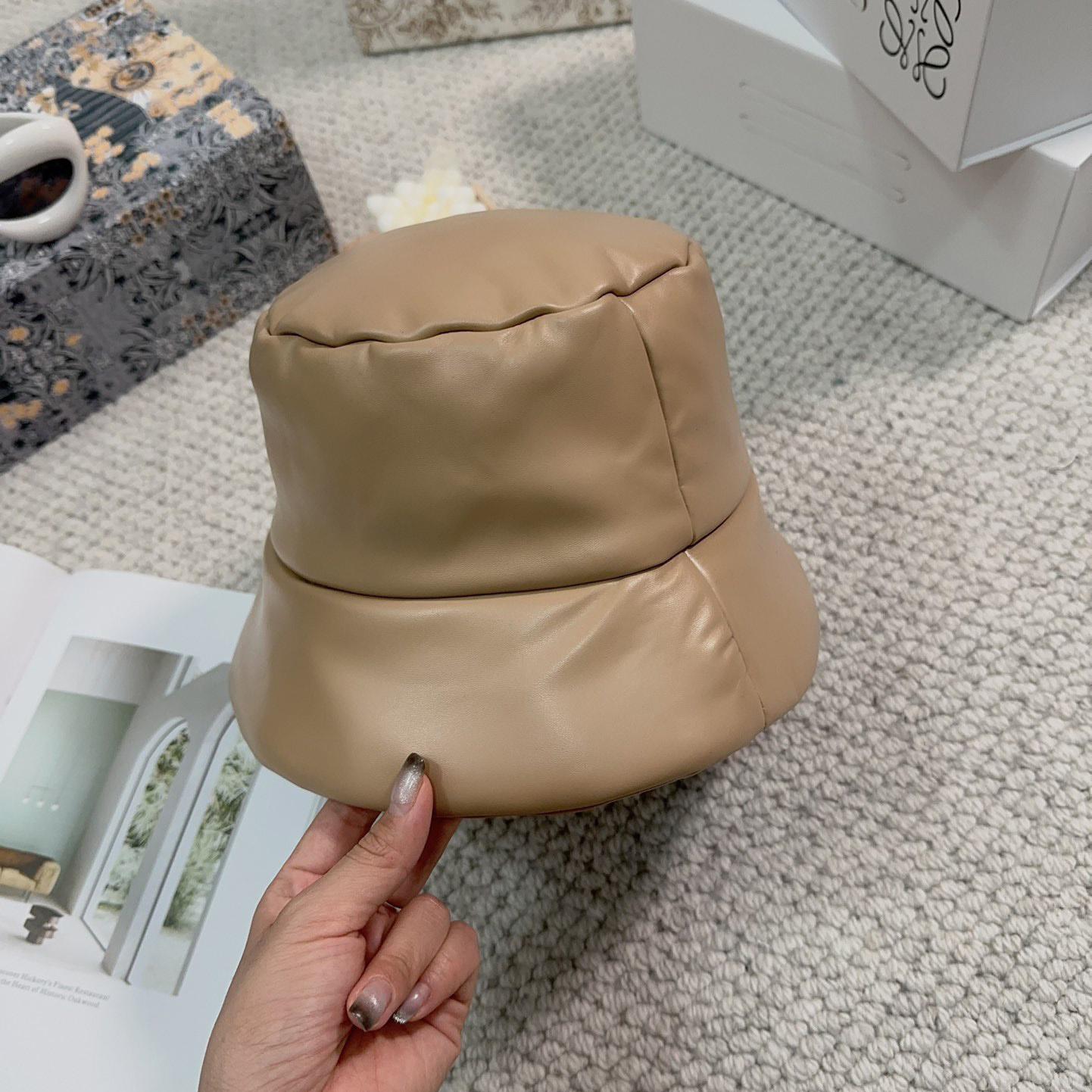 Prada Enamelled-logo Leather Bucket Hat - FashionPlug