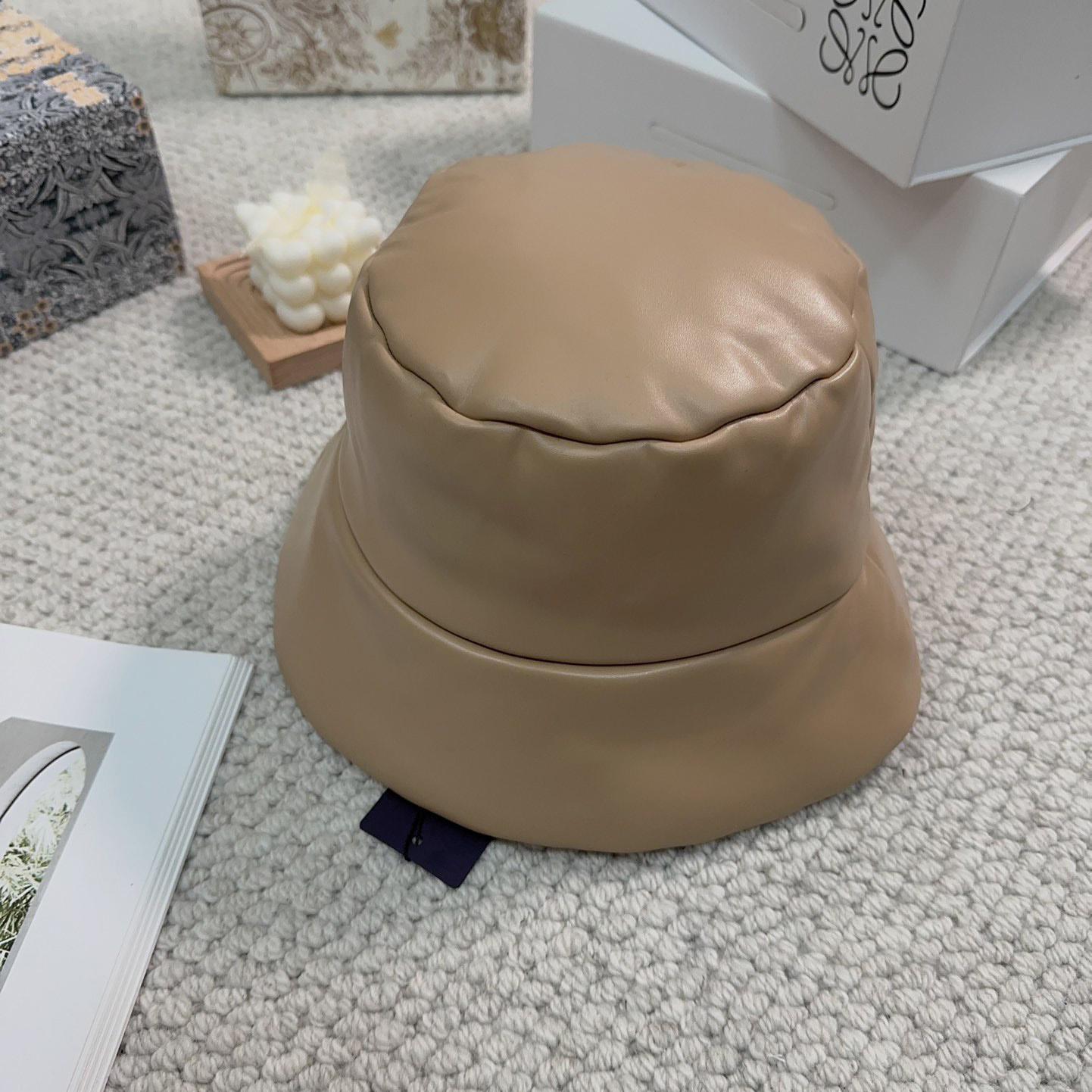 Prada Enamelled-logo Leather Bucket Hat - FashionPlug