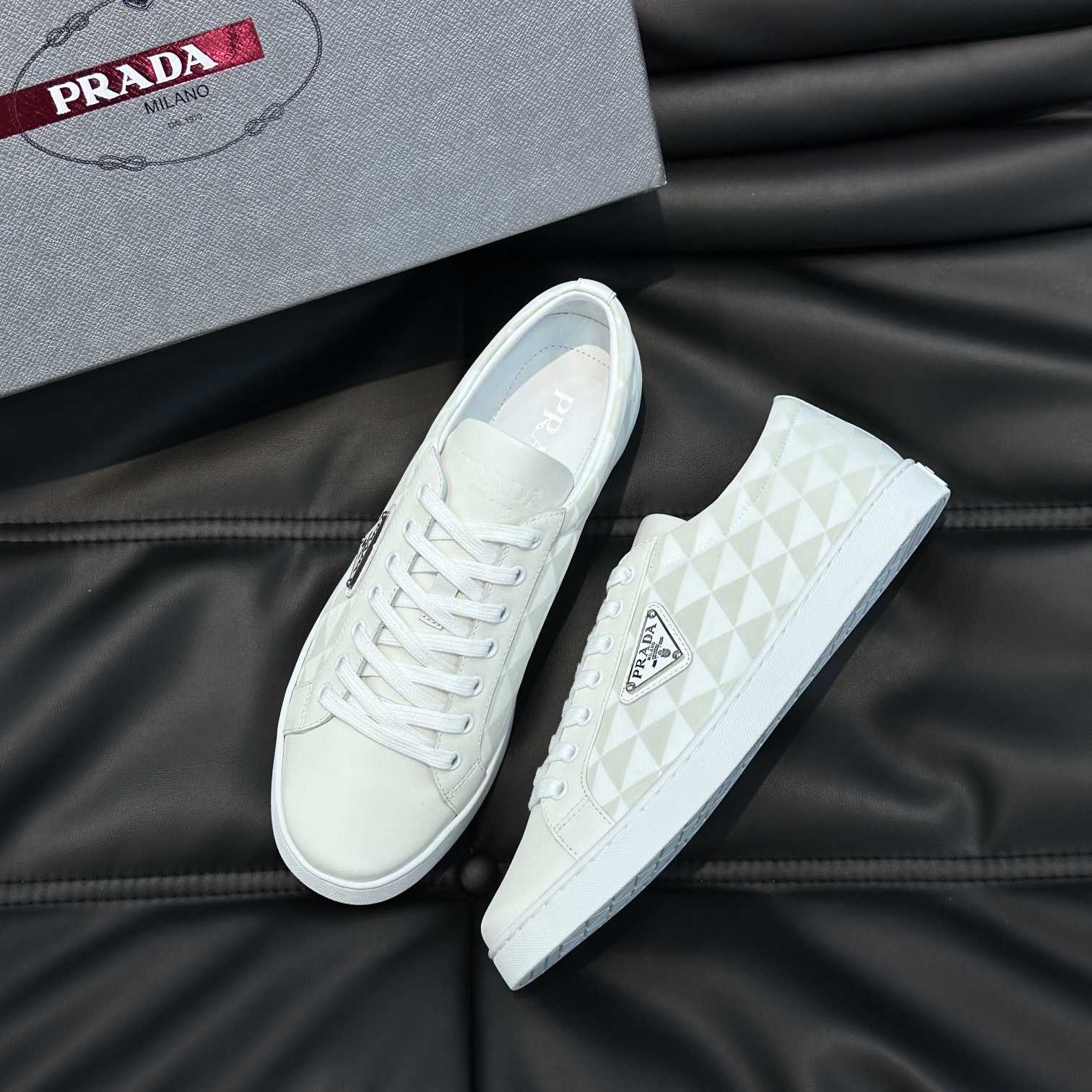 Prada Leather And Re-Nylon Sneakers - FashionPlug