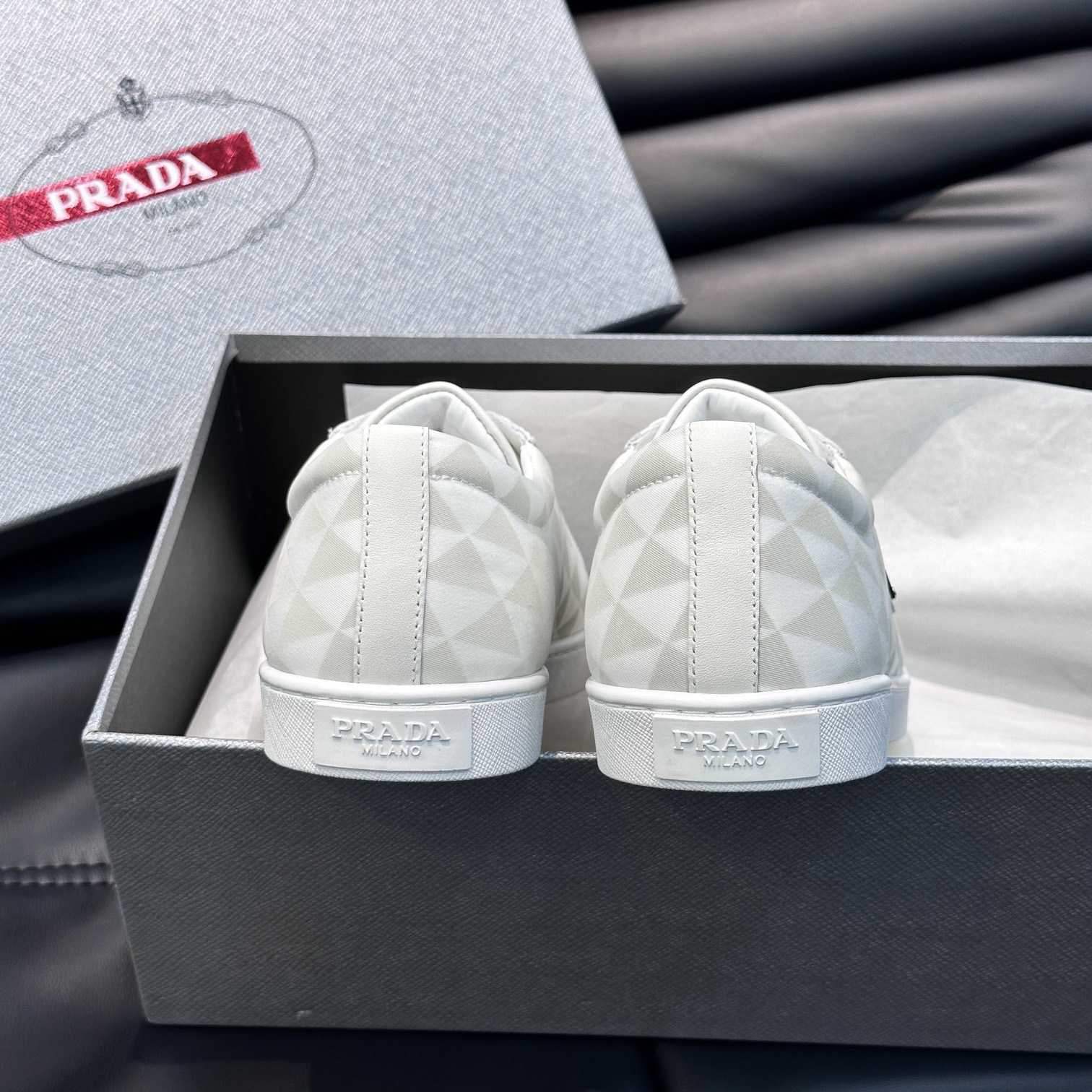 Prada Leather And Re-Nylon Sneakers - FashionPlug