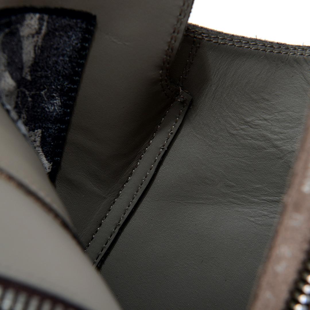 Rick Owens High-Top Sneakers - FashionPlug