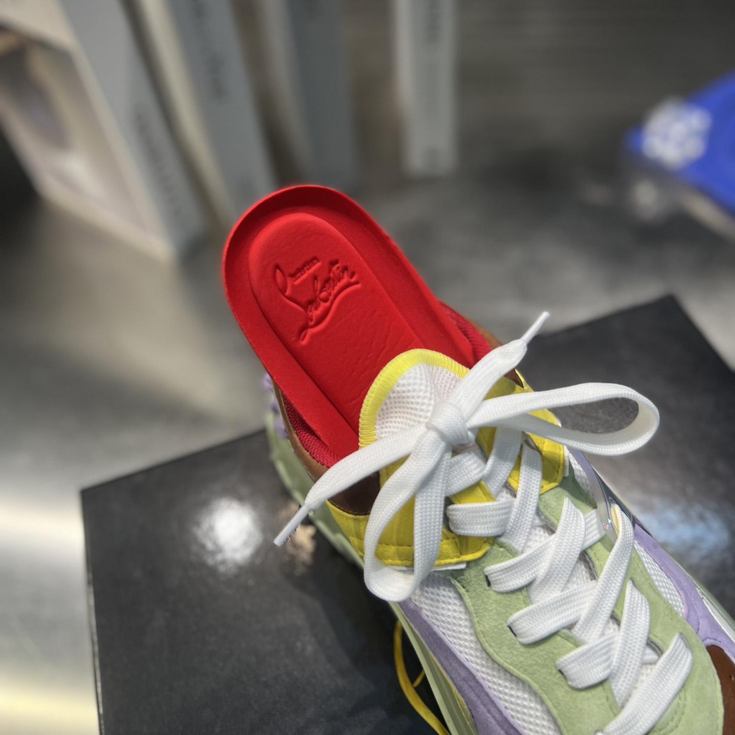 Christian Louboutin Astroloubi Sneakers - FashionPlug
