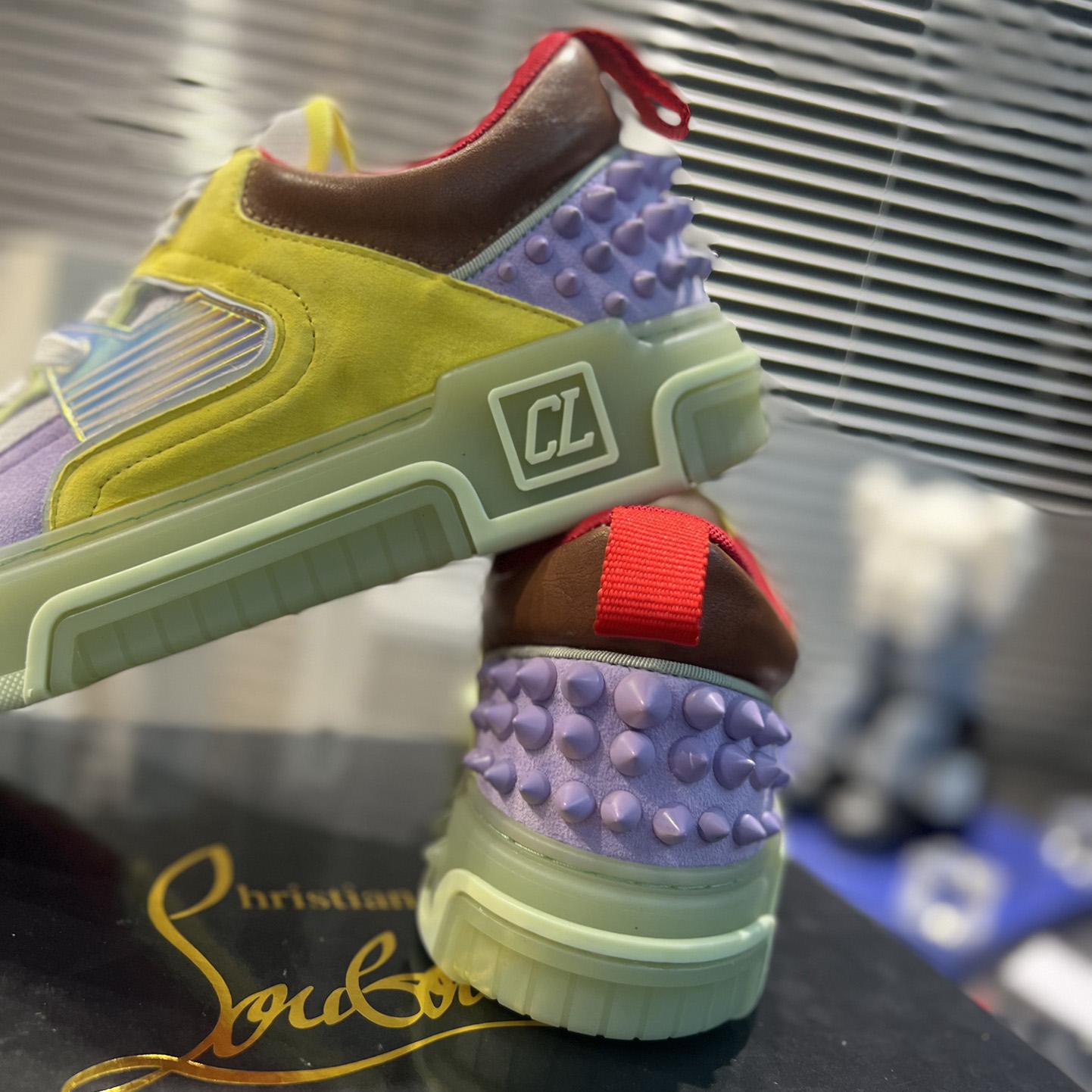 Christian Louboutin Astroloubi Sneakers - FashionPlug