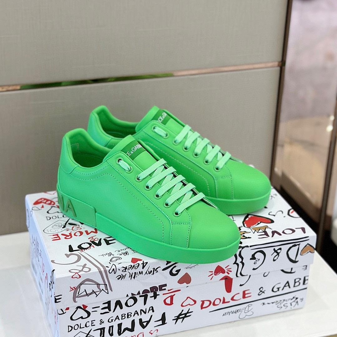 Dolce & Gabbana Embossed Logo Sneakers - FashionPlug