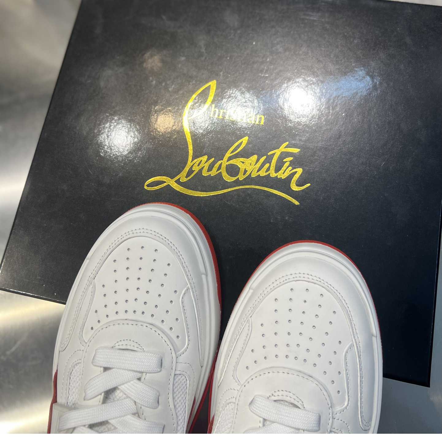 Christian Louboutin Astroloubi Sneakers - FashionPlug