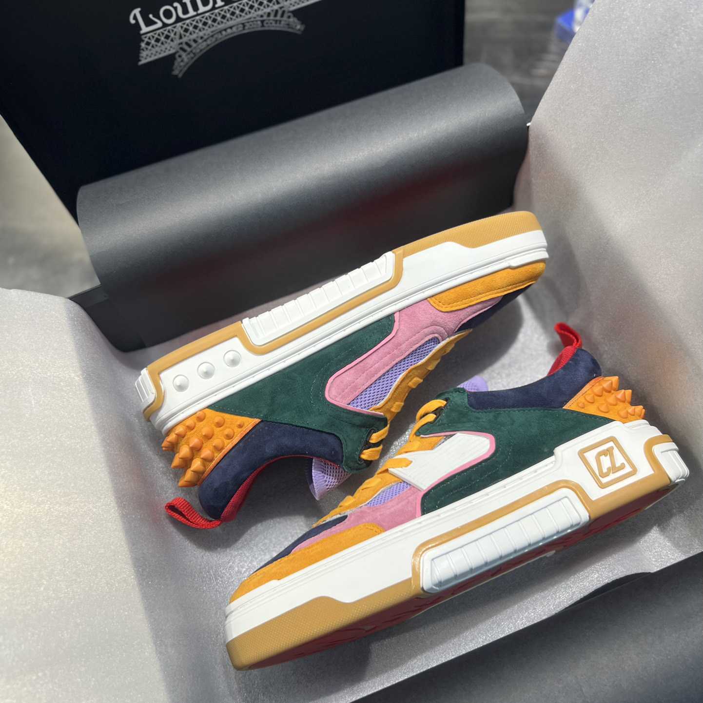 Christian Louboutin Astroloubi Sneakers - FashionPlug