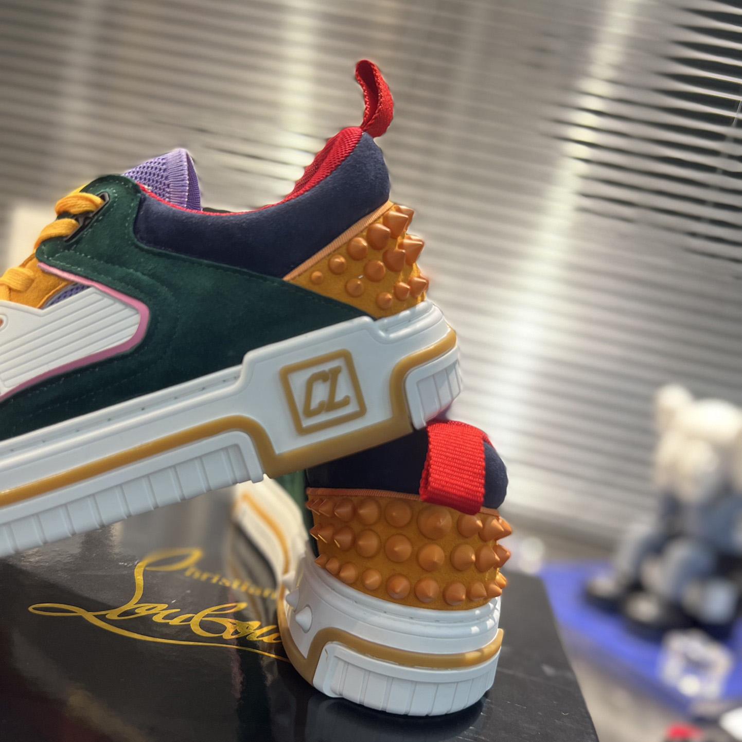 Christian Louboutin Astroloubi Sneakers - FashionPlug