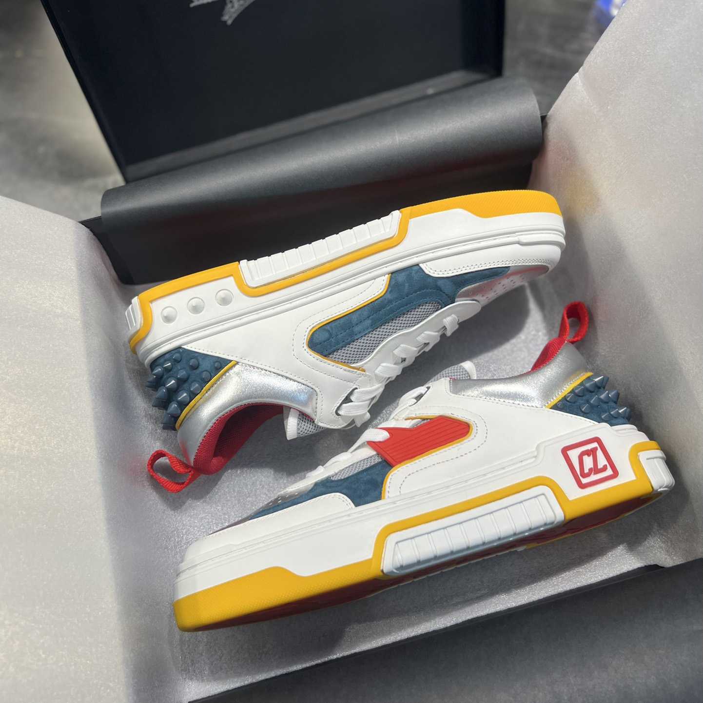 Christian Louboutin Astroloubi Sneakers - FashionPlug