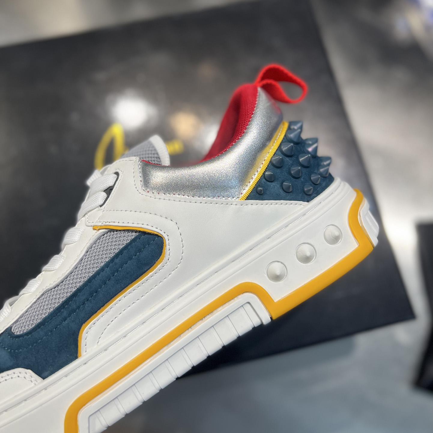 Christian Louboutin Astroloubi Sneakers - FashionPlug