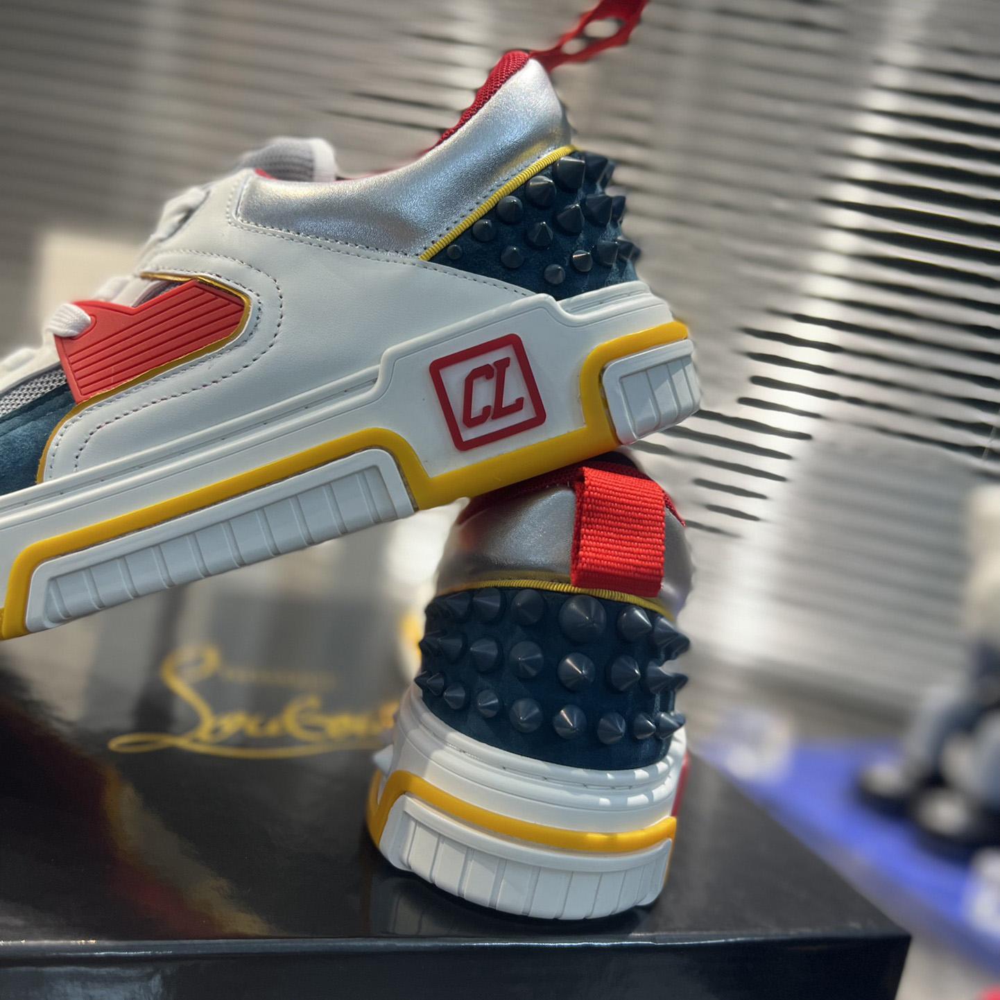 Christian Louboutin Astroloubi Sneakers - FashionPlug