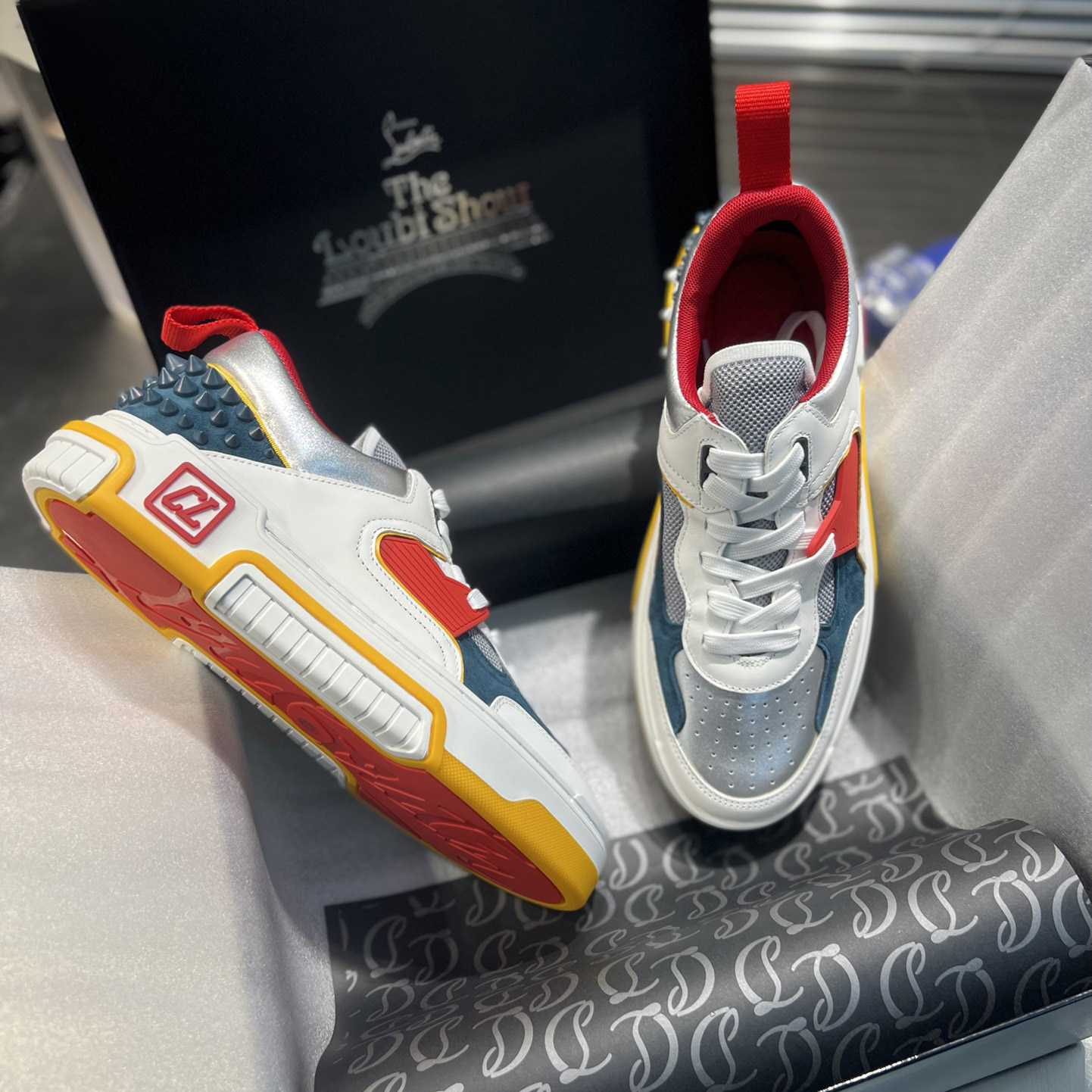 Christian Louboutin Astroloubi Sneakers - FashionPlug