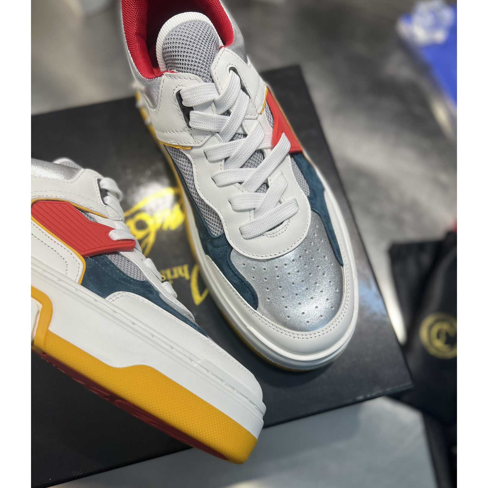 Christian Louboutin Astroloubi Sneakers - FashionPlug