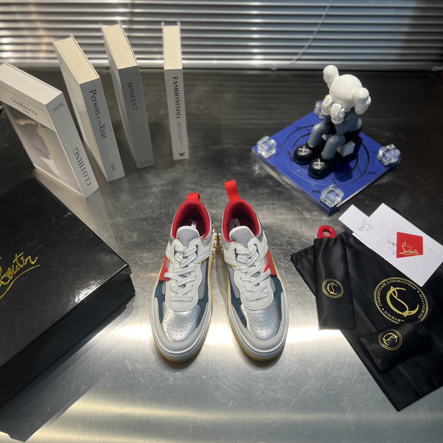 Christian Louboutin Astroloubi Sneakers - FashionPlug