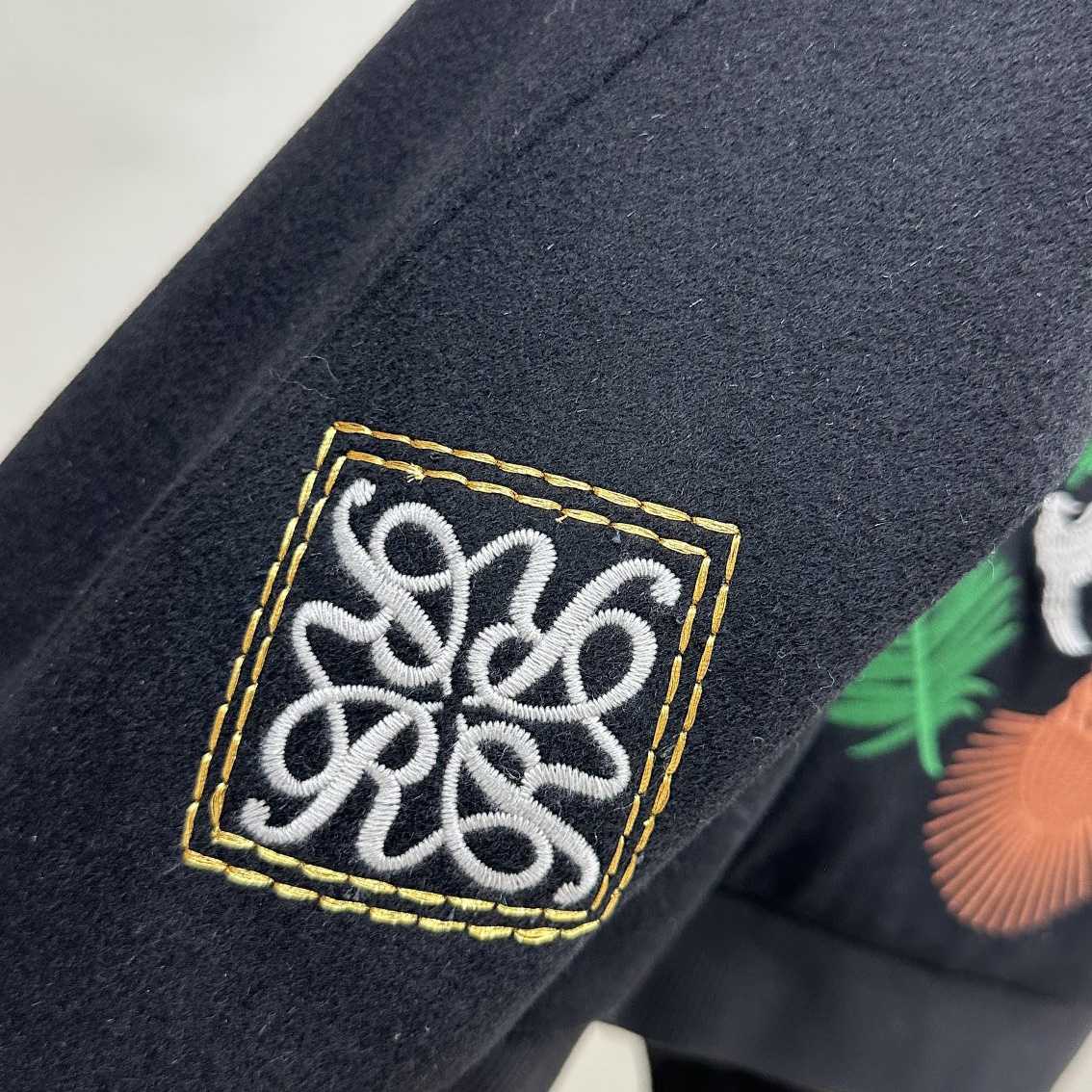 Rhude Graphic Crest Jacket - FashionPlug