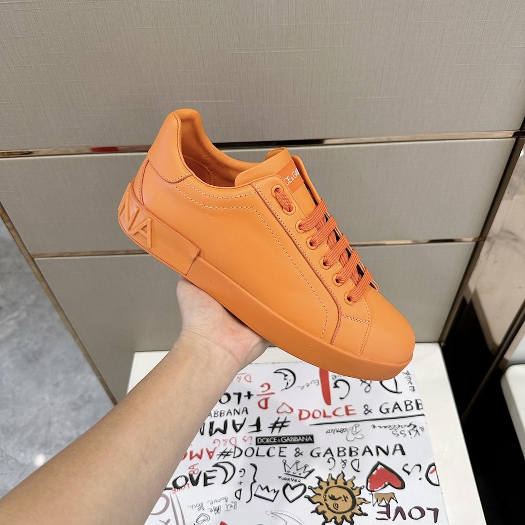 Dolce & Gabbana Embossed Logo Sneakers - FashionPlug