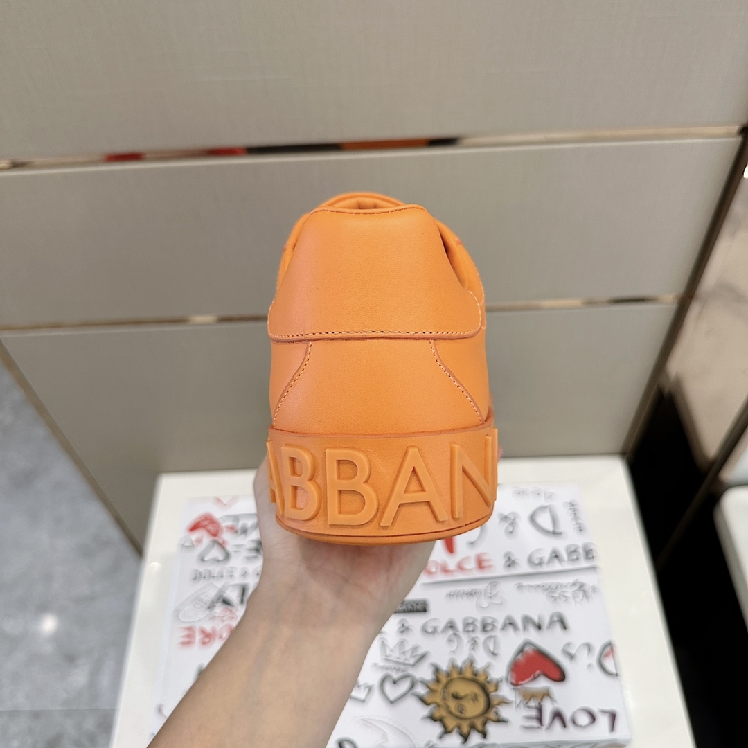 Dolce & Gabbana Embossed Logo Sneakers - FashionPlug