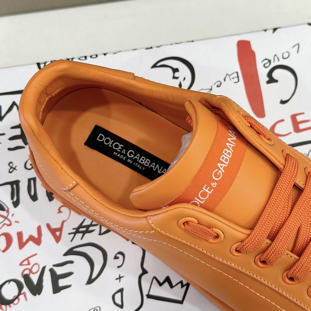 Dolce & Gabbana Embossed Logo Sneakers - FashionPlug