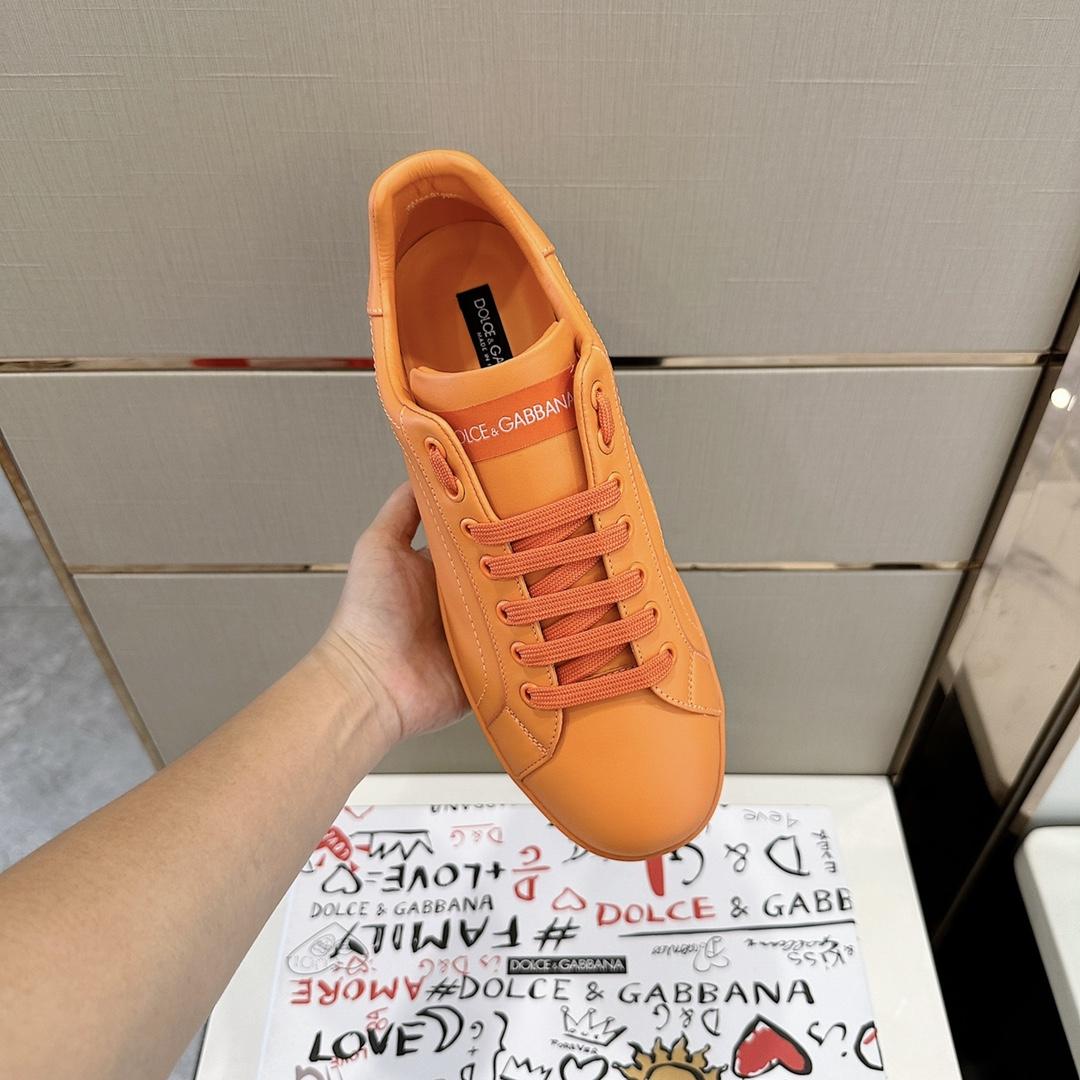 Dolce & Gabbana Embossed Logo Sneakers - FashionPlug