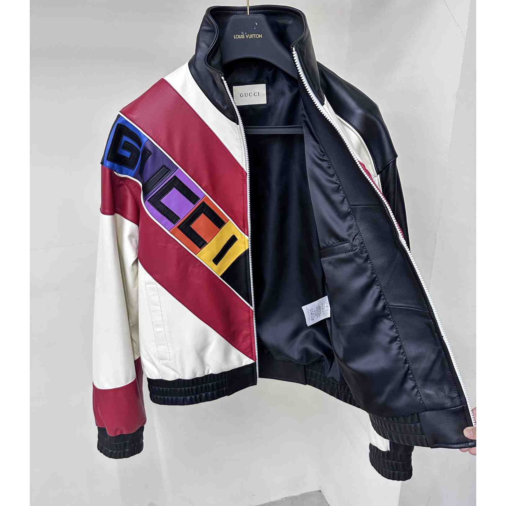 Gucci Leather Bomber Jacket With Gucci Lettering - FashionPlug