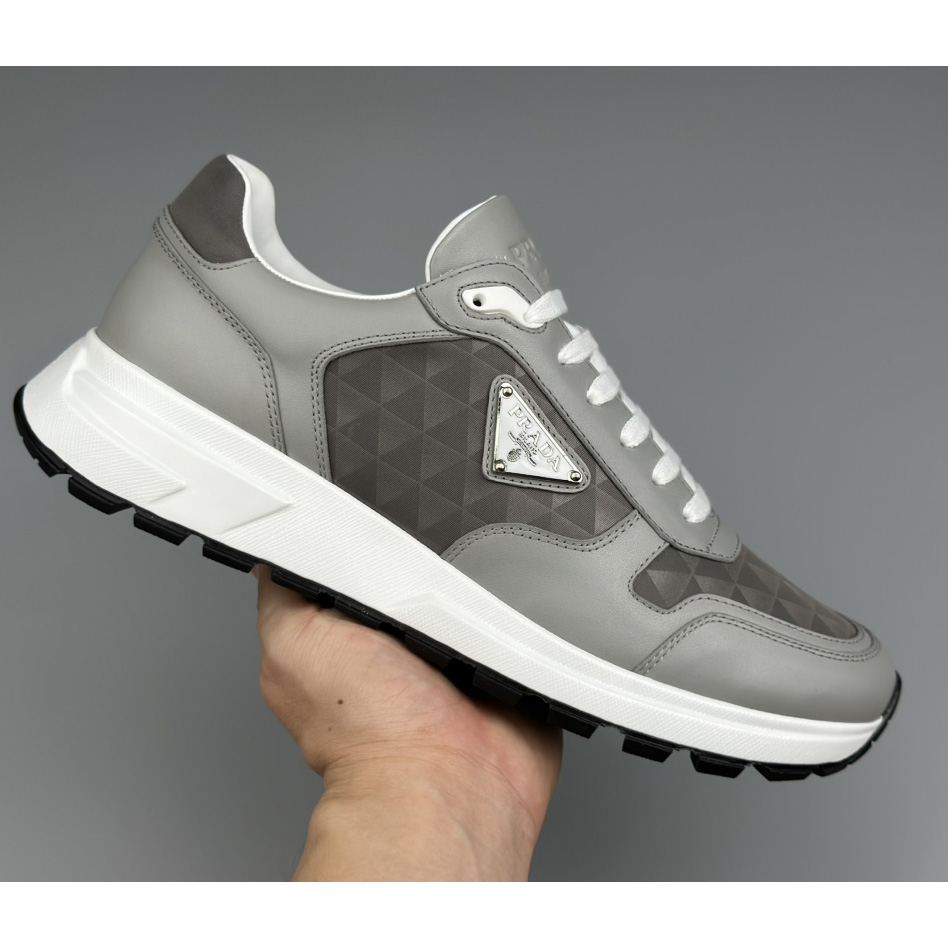 Prada Leather And Re-Nylon High-top Sneakers - FashionPlug