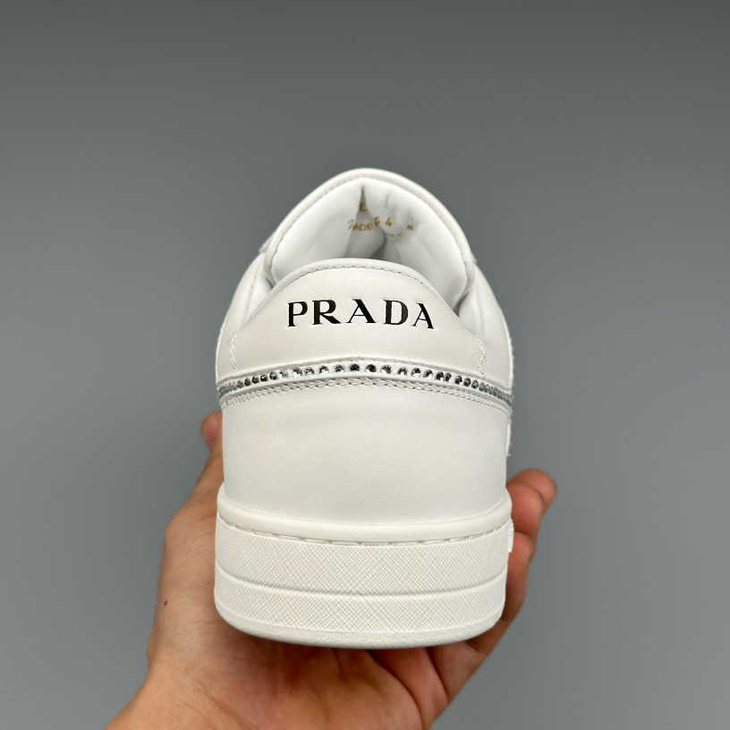 Prada Downtown Perforated Leather Sneakers - FashionPlug