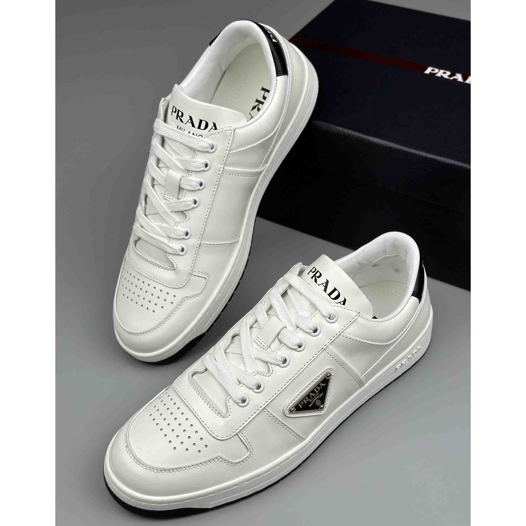 Prada Downtown Perforated Leather Sneakers - FashionPlug