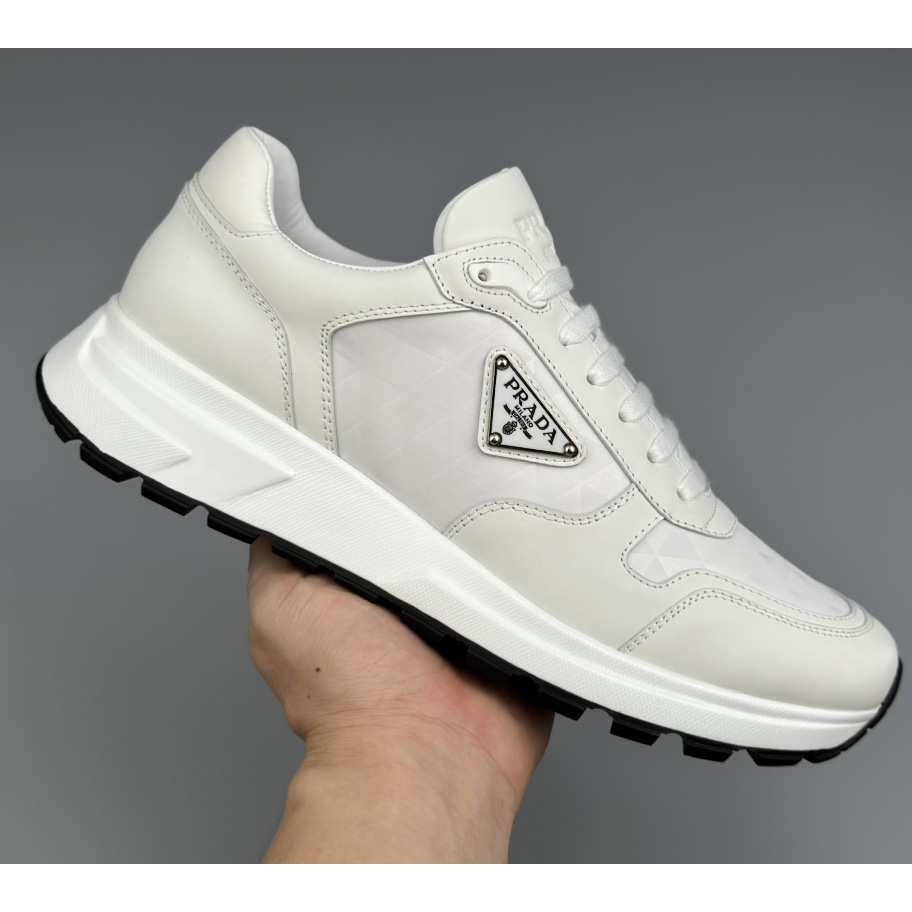 Prada Leather And Re-Nylon High-top Sneakers - FashionPlug