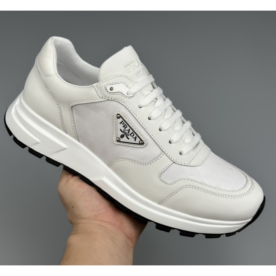 Prada Leather And Re-Nylon High-top Sneakers - FashionPlug