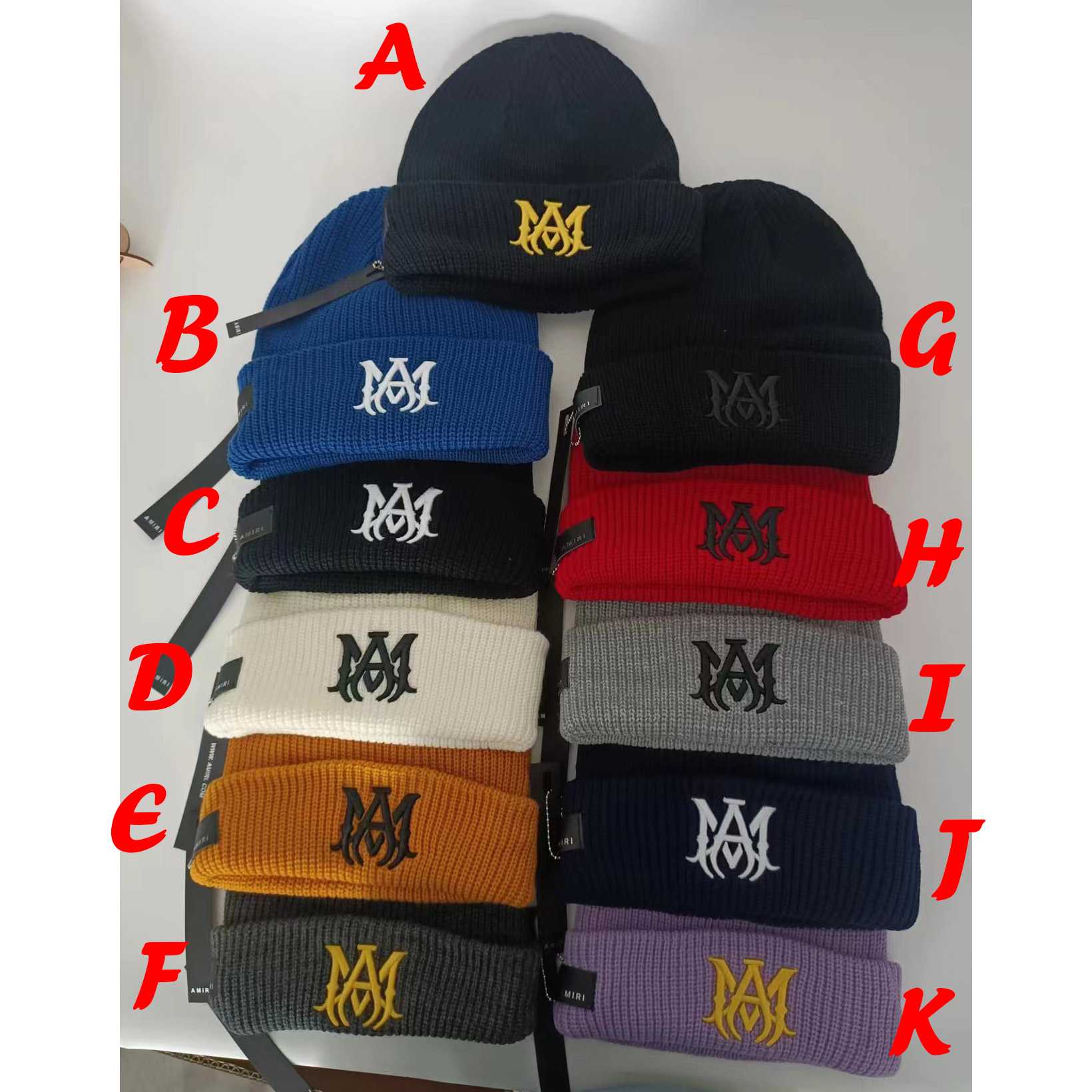 Amiri Logo-embroidered Ribbed-knit Beanie - FashionPlug