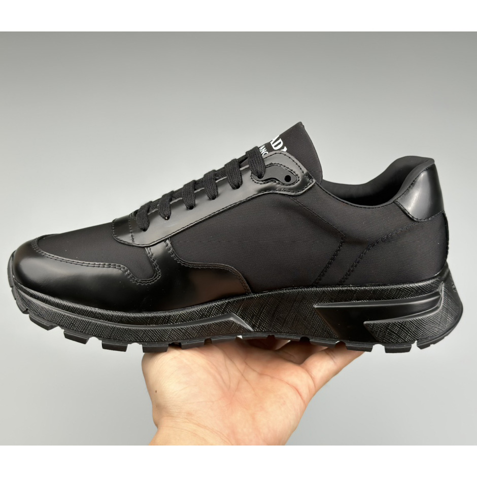 Prada Re-Nylon And Brushed Leather Sneakers - FashionPlug