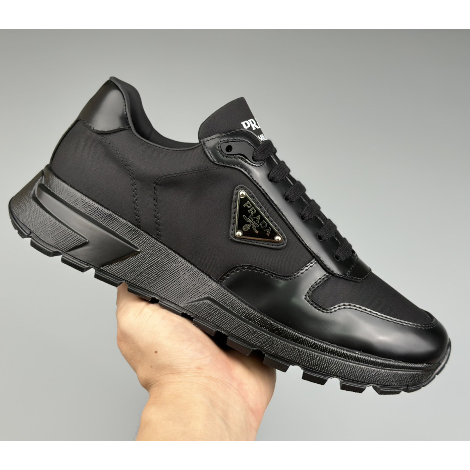 Prada Re-Nylon And Brushed Leather Sneakers - FashionPlug
