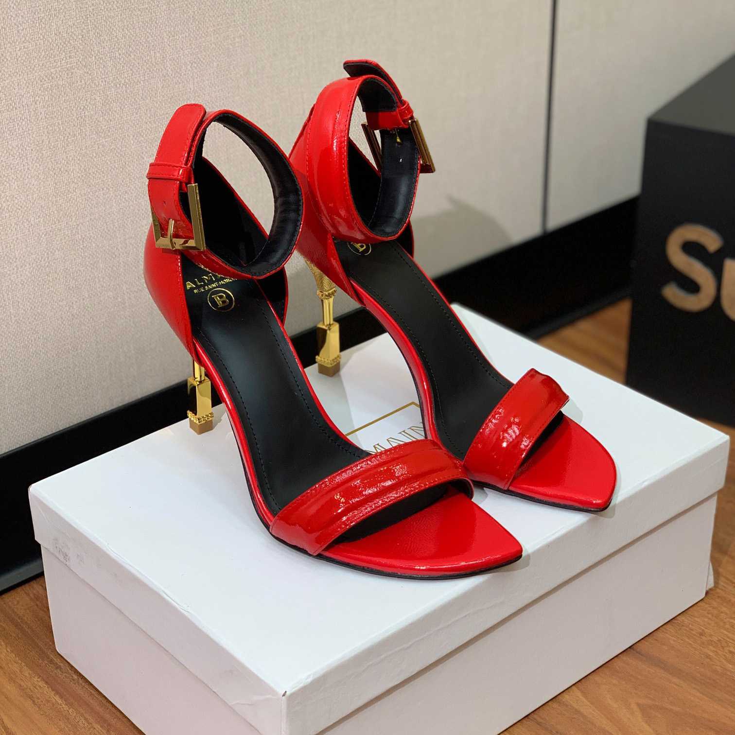 Balmain Moneta Patent Leather Sandals - FashionPlug