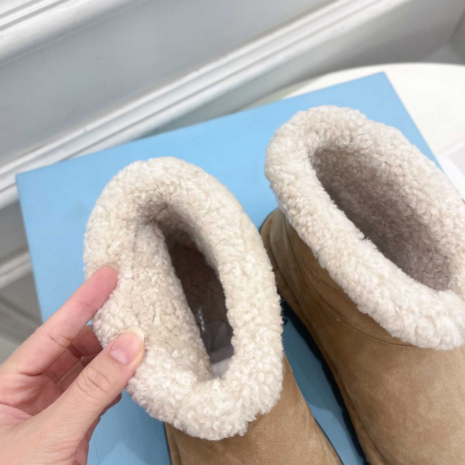 Prada Shearling Booties - FashionPlug