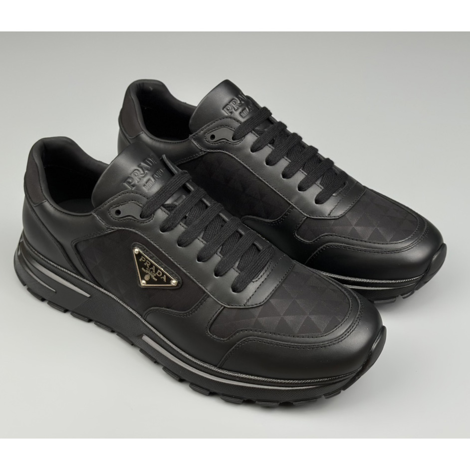 Prada Leather And Re-Nylon High-top Sneakers - FashionPlug