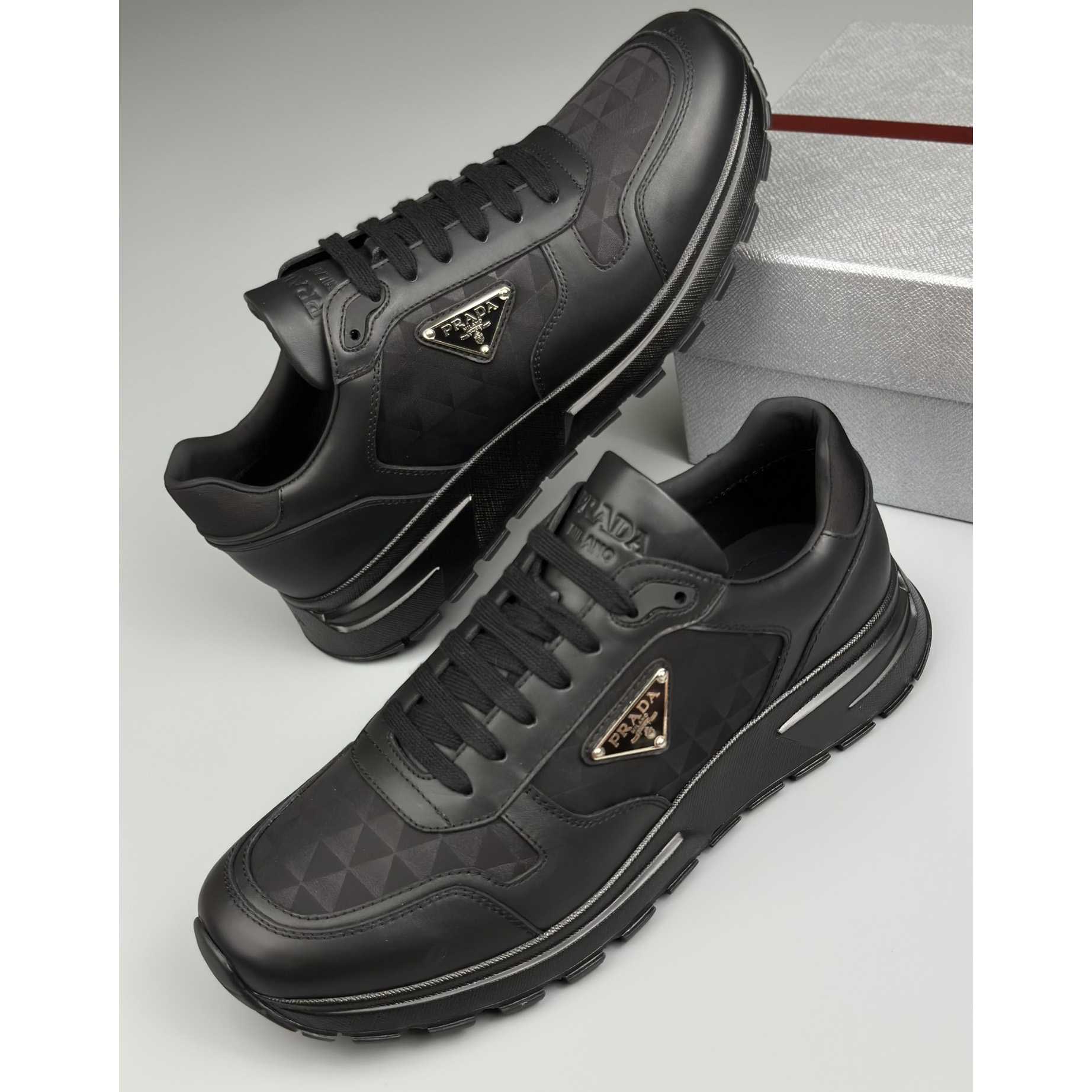 Prada Leather And Re-Nylon High-top Sneakers - FashionPlug