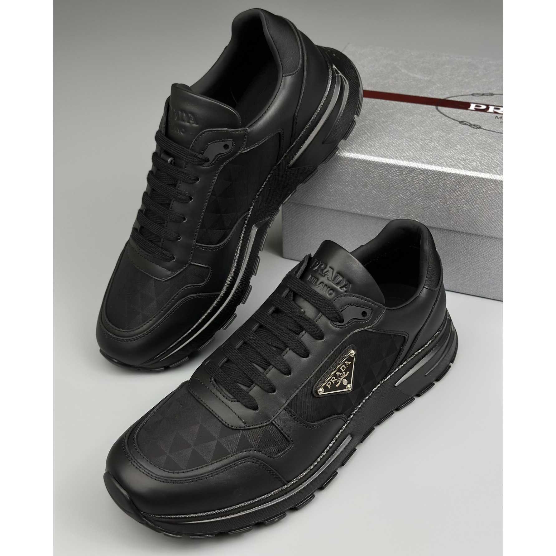 Prada Leather And Re-Nylon High-top Sneakers - FashionPlug