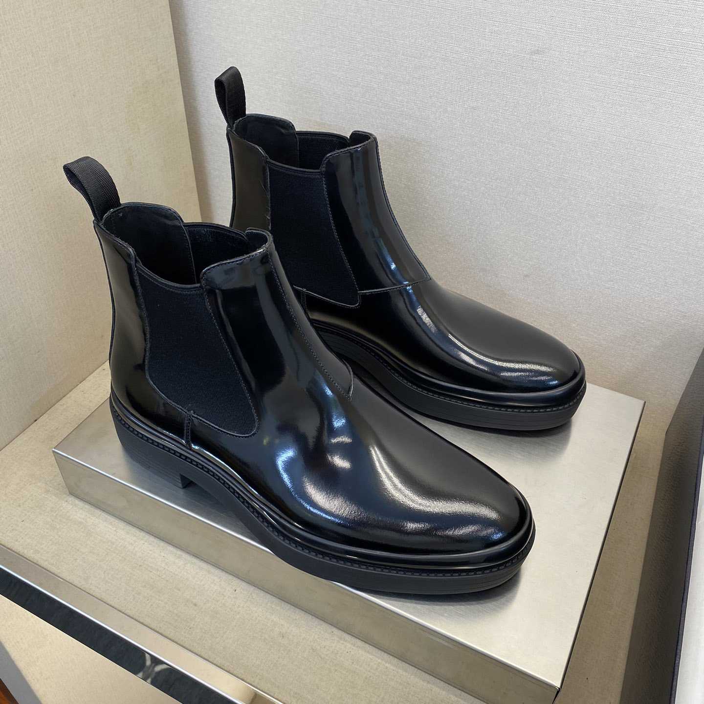 Prada Brushed Leather Chelsea Boots - FashionPlug
